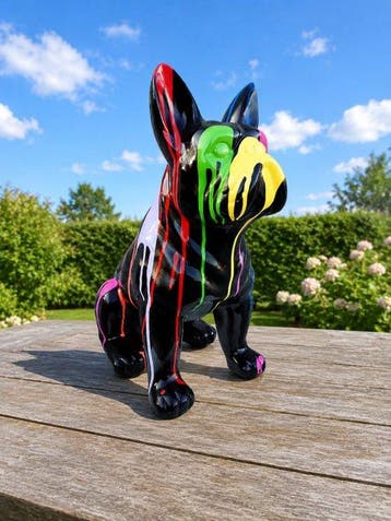 Beeld, pub or French bulldog black sitting in color paint