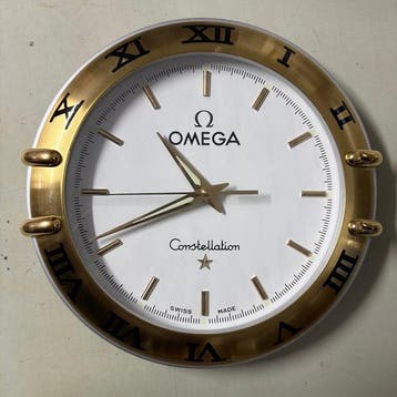 Klok - Omega by Ruegg - Metaal - 2000-2010, Antiek en Kunst