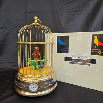 Automaton van een vogel in vogelkastje - Zwitserland -