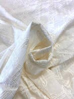 Elegante en verfijnde jacquardstof met reliëfborduursels in