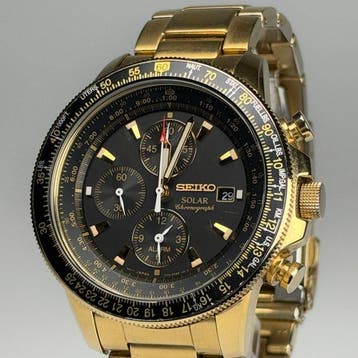 Seiko - Solar Alarm Chronograph Compass Gold Tone - Zonder