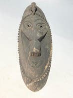 Een masker heeft generaties lang standgehouden in het, Antiek en Kunst