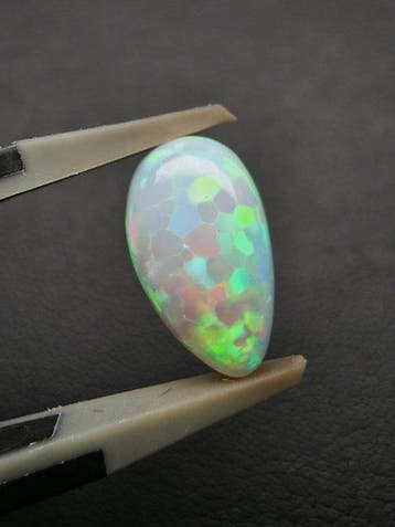 2.3cts Witte Opaal Cabochon- 0.46 g