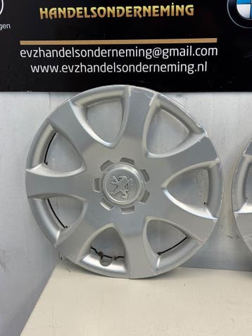 Org. Wieldoppen set 14 inch Peugeot 107 art.42602-0H050, Gebruikt