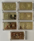 Historische collectie van 7 goudbaren van 24 karaat, verguld
