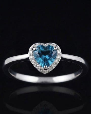 Topaas - Zilver, Het Hart van de Oceaan – Ring met Blauwe