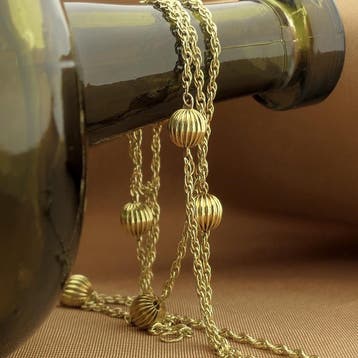 Gouden gedraaide schakelketting met bollen., Ophalen of Verzenden, Gebruikt, Goud, Goud