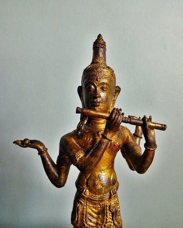 Krishna die de fluit (Bansuri) bespeelt (Zonder