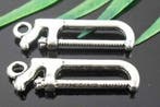 10x Tibetaans zilveren bedel van een handzaag 26 x 8mm, Ophalen of Verzenden, Nieuw, Bedel