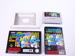 SNES - The Smurfs/ Les Schtroumpfs: Autour du Monde - Box..., Ophalen of Verzenden, Nieuw
