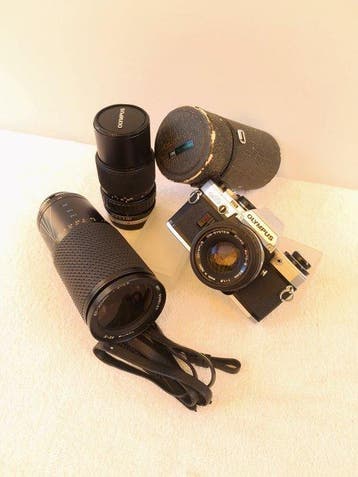 Olympus OM-10 + 50 mm f 1.8 Zuiko + Zoom Zuiko 75/150 f.4 +, Nieuw
