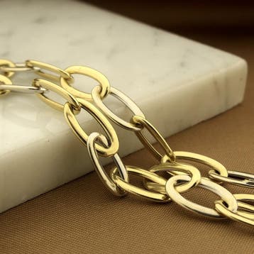 Monzario bicolor gouden wijde ankerschakel armband, Ophalen of Verzenden, Gebruikt, Goud, Goud
