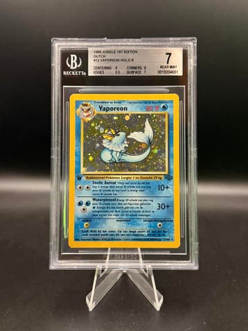 Beckett 7 Pokemon 1999 DUTCH 1st Edition Vaporeon Holo#12/64, Verzenden, Zo goed als nieuw, Losse kaart