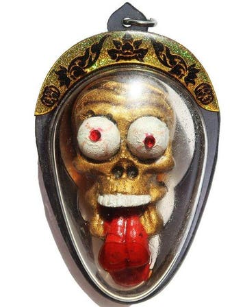 Schedelamulet Verorger en Dubbelzegel van aas: Dominatie,