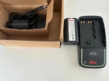 Leica oplader GKL 311 met Leica accu GEB 211, Ophalen of Verzenden, Gebruikt