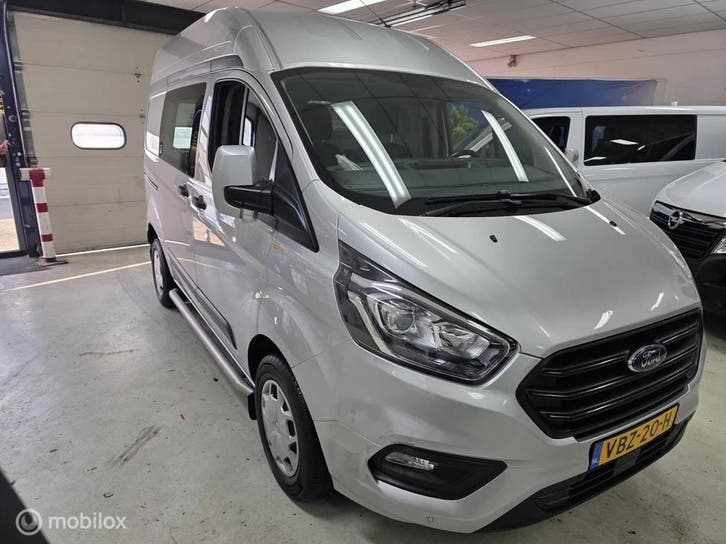 Zakelijke lease - Ford Transit Custom 2.0 TDCI L1H2 met 2, Auto's, Bestelauto's, Handgeschakeld, Financial lease, Ford, ABS, Airbags