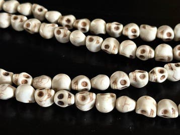 Ketting met handgesneden schedelkralen - yakbeen - Kali