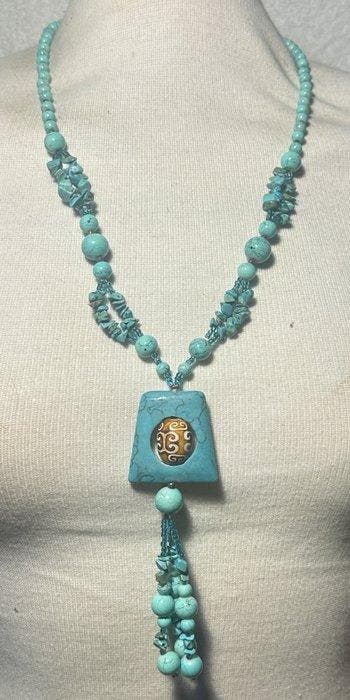 Gestabiliseerde turkoois met Tibetaans Dzi-amulet Rustige