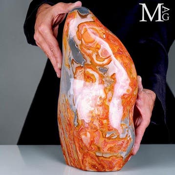 Levendige veelkleurige jaspis met oranje en koelgrijze