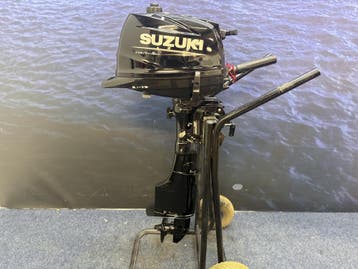 “Suzuki 6 pk buitenboordmotor | Nieuwstaat, 5 tot 10 pk, Viertaktmotor, Ophalen of Verzenden, Zo goed als nieuw