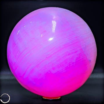 Adembenemende roze calcietkogel – Zeer fluorescerend en