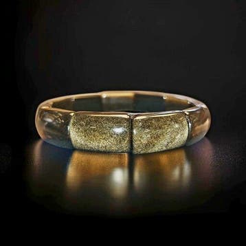 Zonder voorbehoud. Armband van gouden obsidiaan van hoge
