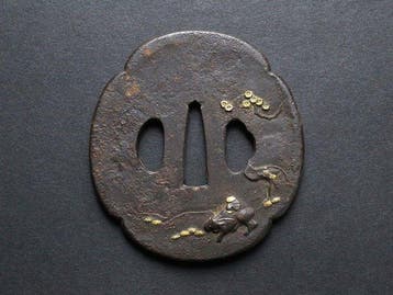 Mokko-vormige tsuba zwaardbeschermer – Os en bloemen in