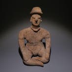 Colima, Westkust van Mexico Terracotta Zittende figuur. 11,5