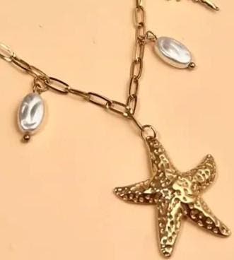 Ketting met zeesterren en schelpen, Nieuw, Ophalen of Verzenden, Goud, Overige materialen