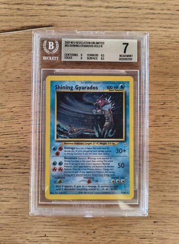 Pokémon - 1 Graded card - Shining Gyarados 65/64 Holo -, Hobby en Vrije tijd, Nieuw