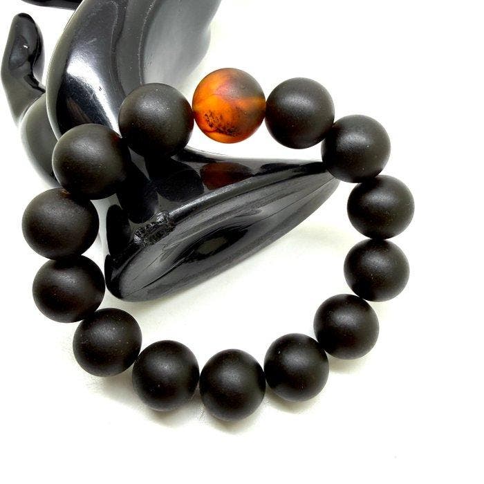 Armband Baltisch barnsteen kralen in zwart/cognac 16 mm 33,8, Antiek en Kunst, Curiosa en Brocante