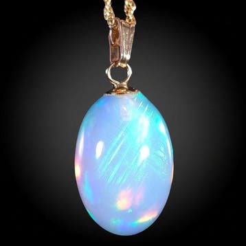 Geen reserve – 6,70 ct Lichtgevend blauwgroene vuur ovaal