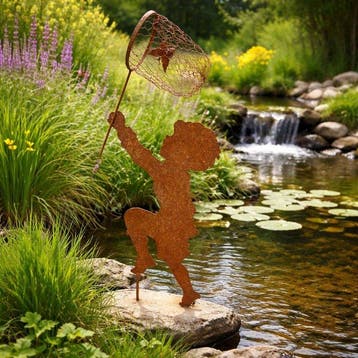 Beeld, garden statue silhouette of boy with butterfly net -