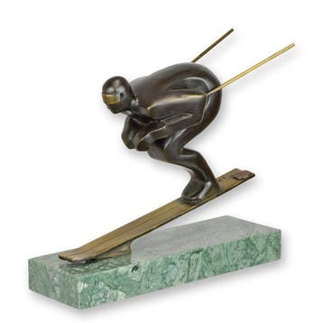 sculptuur, A Dynamic Signed Bronze Figure of a Skier Defying