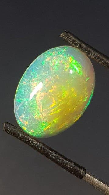 1 pcs Oranje, Meerkleurig Opaal - 4.55 ct - Antwerp, Sieraden, Tassen en Uiterlijk, Edelstenen, Nieuw