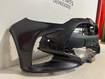 Toyota Yaris XP210 Voorbumper 52119-ODAOO, Ophalen, Gebruikt, Voor, Bumper