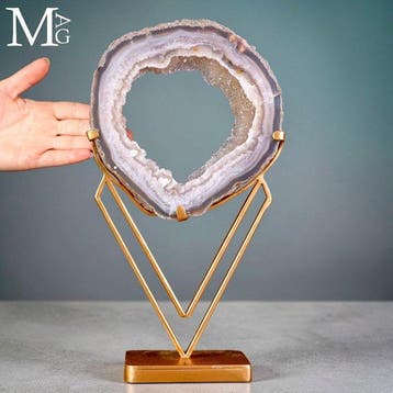 Gelaagde agaat-geode schijf met een sprankelende