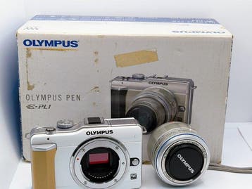 Olympus E-PL1 + M.Zuiko Digital 14-42mm F3.5-5.6 zoom lens, Audio, Tv en Foto, Fotocamera's Digitaal, Nieuw