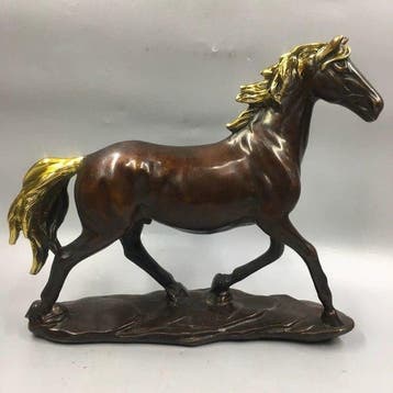 Decoratief ornament - koper verguld galopperend