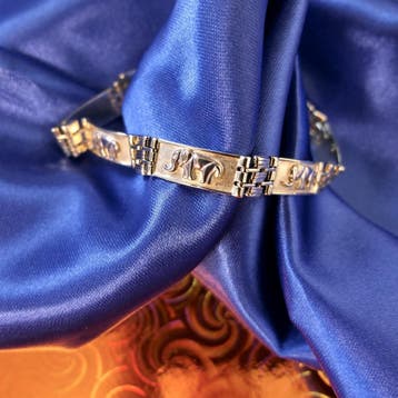 Bicolor gouden schakelarmband met olifanten, Sieraden, Tassen en Uiterlijk, Armbanden, Ophalen of Verzenden, Gebruikt, Goud, Goud