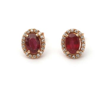 Een paar 14 krt. roségouden oorstekers met robijn en diamant, Sieraden, Tassen en Uiterlijk, Oorbellen, Gebruikt