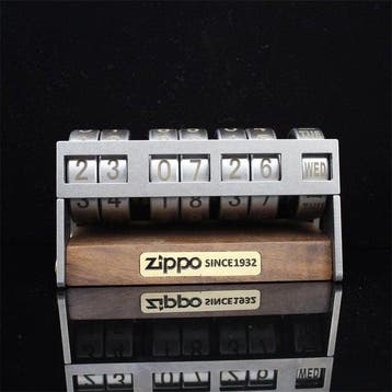 Eeuwigdurende kalender - Zippo - Mechanische rollen, Antiek en Kunst