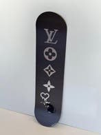 Rob VanMore - Skating by LV x Banksy Rat