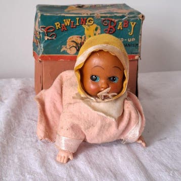 Toy Nomura - Crawling baby - Opwindbaar blikken speelgoed -