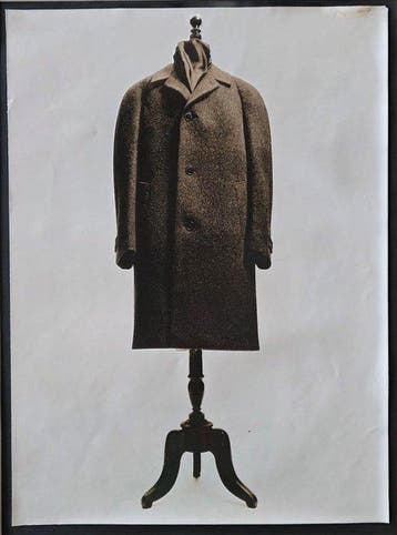 Michael Joseph (1941-) - Coat on stand in studio