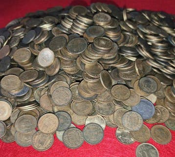 Spanje: een lot van 5,4 kilos munten van één peseta.