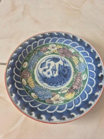 Porseleinen bord uit China Qing-dynastie, decor met vissen,