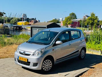 Daihatsu Cuore 1.0 5DR AUT 2007 Airco/NAP/DealerOH/ElekRamen, Dealer onderhouden, Stof, Gebruikt, Zwart