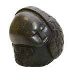 Stenen sculptuur door Charles Atonia (Afrika)