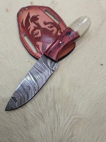 Traditional Damascus Steel Knife with Decorative Leather